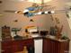 Bar area with vintage decor and mini-refrigerator at 236 Olde Ferry Ln, Dunn, NC 28334