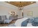Main bedroom with wood ceiling and large windows at 62 Teal Trace Ct, Pittsboro, NC 27312