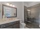 Elegant bathroom with a large walk-in shower and modern vanity at 62 Teal Trace Ct, Pittsboro, NC 27312