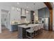 Gourmet kitchen with large island and stainless steel appliances at 62 Teal Trace Ct, Pittsboro, NC 27312