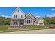 Two-story home with stone and siding exterior at 62 Teal Trace Ct, Pittsboro, NC 27312