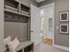 Convenient laundry room with built-in shelving and storage at 62 Teal Trace Ct, Pittsboro, NC 27312