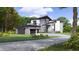 Contemporary home with a two-car garage and attractive landscaping at 114 Mountaintop Cir, Pittsboro, NC 27312