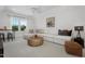 Versatile bonus room with sectional sofa and plenty of space for relaxation at 449 Winding Creek Dr, Lillington, NC 27546