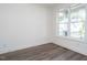 Bright office space featuring hardwood floors and a large window with a view at 1717 Grassy Falls Ln, Wendell, NC 27591
