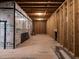 Unfinished basement with exposed framing and potential for customization at 1717 Grassy Falls Ln, Wendell, NC 27591