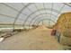 Large barn with high ceilings, perfect for storing hay and equipment at 144A Celebrity Dairy Way, Siler City, NC 27344