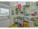 Kitchen features a double sink and extensive shelving for storage at 144A Celebrity Dairy Way, Siler City, NC 27344