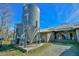 Metal feed bins and storage building in the farmyard at 144A Celebrity Dairy Way, Siler City, NC 27344