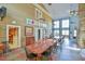 Large dining room with long table and high ceilings at 144A Celebrity Dairy Way, Siler City, NC 27344