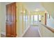 Long hallway with French doors leading to a balcony at 144A Celebrity Dairy Way, Siler City, NC 27344