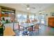 Breakfast room with tables, chairs, and access to patio at 144A Celebrity Dairy Way, Siler City, NC 27344