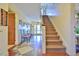 Elegant staircase with a carpeted runner and decorative trim at 144A Celebrity Dairy Way, Siler City, NC 27344