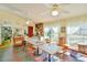 Breakfast room with tables, chairs, and kitchen access at 144A Celebrity Dairy Way, Siler City, NC 27344