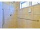 Clean shower with grab bars and tiled walls at 144A Celebrity Dairy Way, Siler City, NC 27344