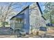 Gray house with a porch and small yard at 144A Celebrity Dairy Way, Siler City, NC 27344