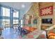 Dining room with large table and stone fireplace at 144A Celebrity Dairy Way, Siler City, NC 27344