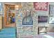 Large stone fireplace in a rustic setting at 144A Celebrity Dairy Way, Siler City, NC 27344