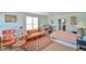 Bedroom with sofa, bed, and window at 144A Celebrity Dairy Way, Siler City, NC 27344