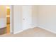 Spacious bedroom with carpet flooring and an adjacent bathroom at 122 Vega Loop # 61, Sanford, NC 27330