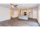 Open concept kitchen and living area with an island and hardwood floors at 122 Vega Loop # 61, Sanford, NC 27330