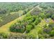 Aerial view of property showcasing home and trees at 2723 New Sharon Church Rd, Hillsborough, NC 27278