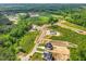 Wide aerial view of a new home development in a wooded area at 85 Harvest View Way, Franklinton, NC 27525
