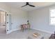 Home office with desk, chair, and ample natural light at 85 Harvest View Way, Franklinton, NC 27525