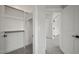 Spacious walk-in closet with shelves and hanging rods at 85 Harvest View Way, Franklinton, NC 27525