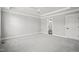 Spacious bedroom with grey carpet and an ensuite bathroom at 85 Harvest View Way, Franklinton, NC 27525