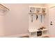 Functional mudroom with bench, cubbies, and hooks at 85 Harvest View Way, Franklinton, NC 27525