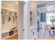 Bright entry with built-in bench, cubbies, and hooks; open to dining area at 85 Harvest View Way, Franklinton, NC 27525