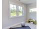 Room with large windows, yoga mat, and exercise ball at 85 Harvest View Way, Franklinton, NC 27525