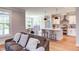 Open concept kitchen and living area with modern finishes at 85 Harvest View Way, Franklinton, NC 27525