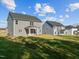 Gray house exterior with backyard at 530 Husketh Rd, Youngsville, NC 27596
