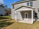 Rear view of house with covered patio at 530 Husketh Rd, Youngsville, NC 27596