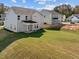 Two story house exterior with gray siding and grassy lawn at 545 Husketh Rd, Youngsville, NC 27596
