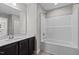 Bathroom with a single vanity, tub and shower combo at 545 Husketh Rd, Youngsville, NC 27596