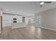 Open concept kitchen with island and access to dining and living areas at 545 Husketh Rd, Youngsville, NC 27596