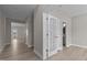 Bright hallway with light flooring, leading to other rooms at 545 Husketh Rd, Youngsville, NC 27596