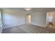 Bright bedroom with neutral carpet and access to hallway and bathroom at 1341 Underbrush Dr, Durham, NC 27703