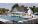 Resort-style pool with cabanas and seating at 70 Ripple Way # 310, Clayton, NC 27520