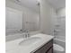 Bathroom boasts a vanity with quartz countertop and shower/tub combo at 86 Brooklynn Trl, Angier, NC 27501