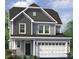 Two-story home with gray siding, white trim, and a two-car garage at 86 Brooklynn Trl, Angier, NC 27501