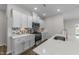 Modern kitchen with stainless steel appliances and white cabinets at 86 Brooklynn Trl, Angier, NC 27501