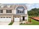 Two-story townhome with two-car garage and landscaped yard at 816 Pryor St # 54, Mebane, NC 27302