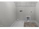 Laundry room with shelving and drain in the floor at 816 Pryor St # 54, Mebane, NC 27302