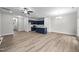Open living area with hardwood floors and ceiling fan at 816 Pryor St # 54, Mebane, NC 27302