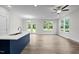 Spacious living area with hardwood floors and large windows at 816 Pryor St # 54, Mebane, NC 27302