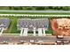 Aerial view of townhome community, showing multiple units and surrounding area at 816 Pryor St # 54, Mebane, NC 27302